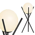 Modern Floor Lamps With White Spherical Shades And Black Intersecting Stands
