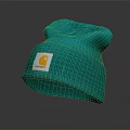 Teal Knitted Beanie With Yellow Logo Patch And Soft Comfortable Texture Design