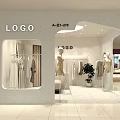 Modern Clothing Store Interior Design With Mannequins Hanging Clothes And Sofa