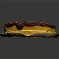 Delicious Layered Cake With Chocolate Glaze And Colorful Sprinkles On Paper Plate