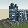 Modern Hotel Building with Glass Facade and Yellow Exterior Featuring Entrance Canopy and Surrounding Trees