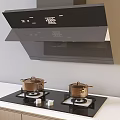 Modern Kitchen Range Hood And Gas Stove With Pots On Countertop
