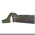 Natural Rustic Garden Landscape With Ivy Covered Reddish Brown Brick Wall And Arched Doorway