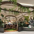 Public Chairs In Mall Rest Area With Green Plants And Rabbit Sculpture
