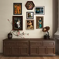 Framed Oil Paintings On Wall With Wooden Cabinet Vase And Gramophone Interior Decor