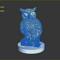 Silver Metallic Owl Sculpture With Intricate Carved Details And Decorative Base