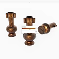 Three Piece Brass Vase Shaped Decorative Ornament Set With Carved Patterns