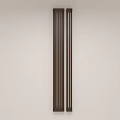 Two Brown Vertical Striped Wall Lamps Mounted On Light Colored Wall