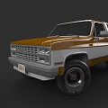 Classic Brown And White SUV With Vintage Design Large Tires And Front Grille