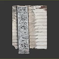 Vintage Stacked Bricks Structure With Decorative Carved Panel And Blue Red Elements
