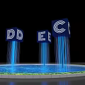 Photo Spot With Blue Cubes Letters D E C Light Beams Circular Pool Green Edges