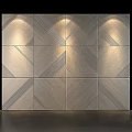 Geometric Patterned Tile Wall Design With Recessed Lighting And Textured Surfaces