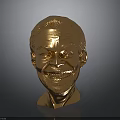 Detailed Golden Human Head Sculpture With Shiny Metallic Surface And Smiling Expression