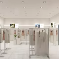 Modern Mall Clothing Counter With Stylish Hanging Clothes Metal Racks And Bright Lighting