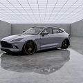 Modern Gray Sports Car With Stylish Black Rims And Sleek Exterior In Showroom Setting