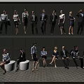 Group of Business Professionals Standing and Sitting in Professional Attire Against Dark Wall and Floor