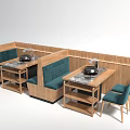 Public Seating In Restaurant With Wooden Booth Green Upholstery And Marble Tabletop