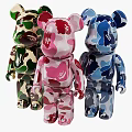 Colorful Camouflage Bear Sculptures With Green Pink Blue Patterns Artistic Design And Detailed Craftsmanship