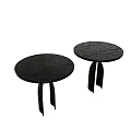 Black Round Top Side Tables With Three Slim Legs And Textured Surface Design