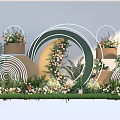 Outdoor Photo Check In Spot With Green Grass And Circular Ring Flower Decorations