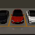 Three Electric Cars In Blue Orange White Colors Parked In Parking Lot