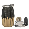 Black And Beige Wooden Stool With Unique Striped Design And Stack Of Books Nearby