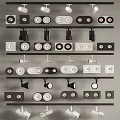 Various Styles Of Downlights And Spotlights Displayed On Multiple Shelves