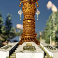 Golden Columnar Landscape Sculpture Surrounded by Pine Trees Blue Sky and Stone Steps