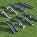 Various Arched Landscape Bridges With Diverse Designs On Green Grass