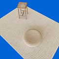 Woven Beige Leisure Chair with Round Cushion and Small Side Table on Woven Rug