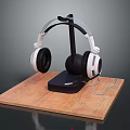 White And Black Headphones On Black Stand With Wooden Platform And Cable