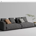 Modern Sectional Sofa With Gray Beige Upholstery Multiple Decorative Pillows Side Table And Green Plant