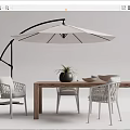 Outdoor Table and Chairs Set Wooden Top White Woven Chairs Umbrella Plant and Bowls