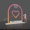 Woman Posing Next to Romantic Arch Landmark With Heart Neon Light