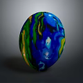 Colorful Decorative Sphere With Swirling Blue Green Yellow Patterns For Modern Interior Decoration