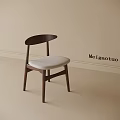 Minimalist Single Chair Featuring Curved Wooden Backrest And Light Gray Fabric Cushion