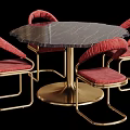 Round Black Marble Dining Table with Red Upholstered Chairs and Gold Metal Frame
