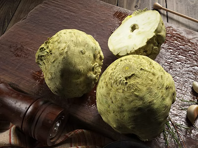 Fresh Celery Root Sliced on Wooden Cutting Board with Garlic and Pepper Grinder 3d model
