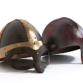 Two Medieval Riveted Helmets With Gold Accents And Bloodstained Red Finish
