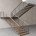 Modern Double Flight Staircase Design With Wooden Steps Metal Railings Gray Walls And Gray Floor