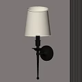 Elegant Wall Lamp with White Fabric Shade and Metal Stand Mounted on Light Colored Wall