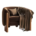 Brown Velvet Armchair with Wooden Legs Pillow and Fringe Blanket