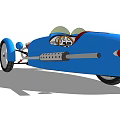 Blue Vintage Three Wheeled Car With Exposed Engine And Large Wheels