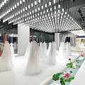 Wedding Dress Store Interior With Elegant Wedding Dresses Display And Large Windows