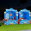 Scenic Outdoor Event Space With Triangular Tent Wooden Deck Tables Chairs Umbrellas And Grassy Area