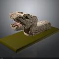 Stone Crocodile Sculpture With Open Mouth And Scaled Texture On Green Base