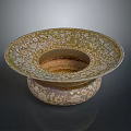 Intricate Bowl Shaped Sculpture Carving With Gold And White Patterns And Circular Base