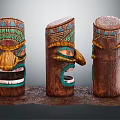Decorative Wooden Columns With Intricate Carved Faces And Vibrant Colorful Patterns