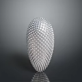 Silver Oval Intricate Object With Dense Spherical Protrusions And Reflective Surface