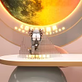 Modern Public Office Space With Moon Shaped Wall Art Round Desk And Green Plants